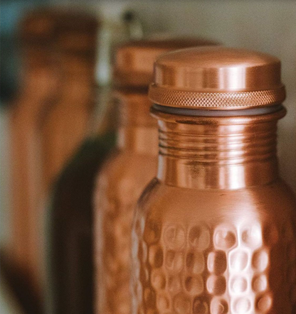 Hammered texture detail of handcrafted copper water bottle premium finish