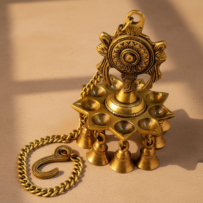 Handcrafted brass Shankh Chakra hanging diya with traditional bells